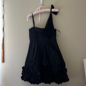 BCBG Maxazria Strapless with a one shoulder detail/bottom petal detail